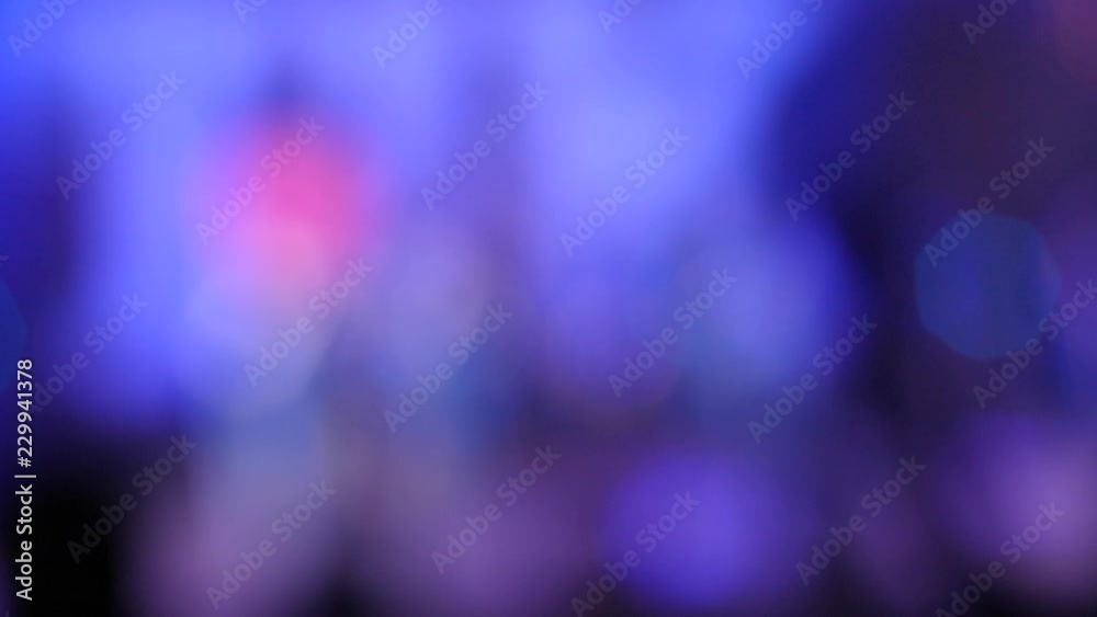 Defocus heptagons of spotlight lumiere flashing and blinking on a concert