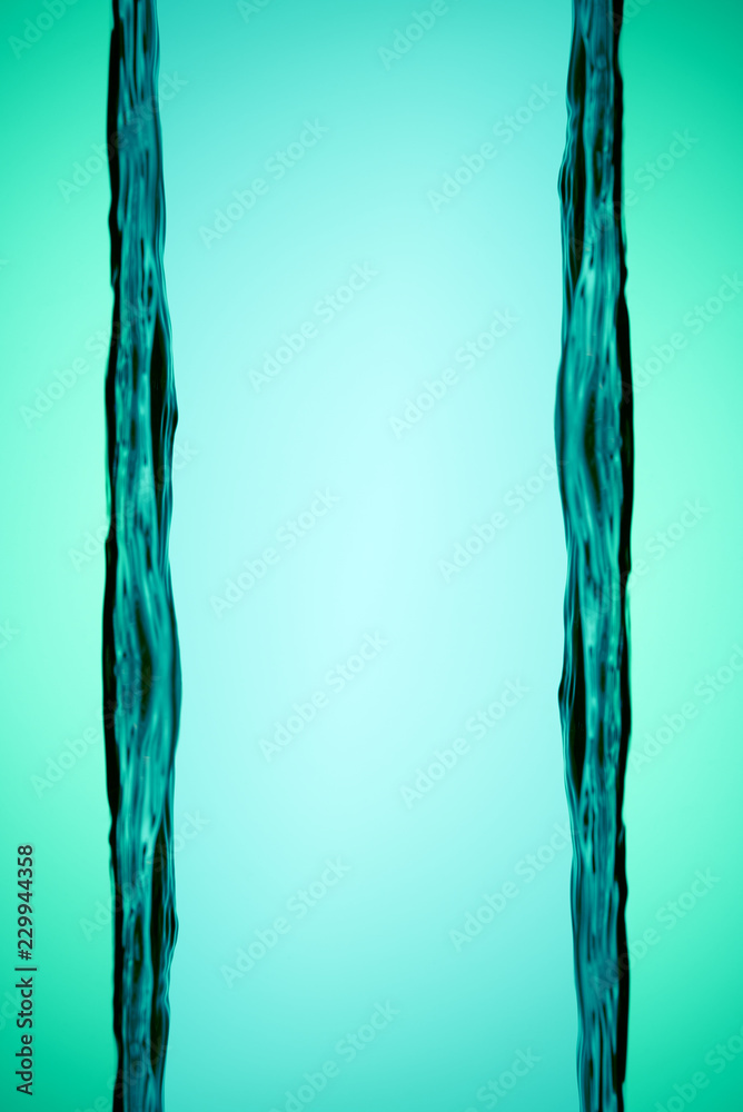 Conceptual background. Two strips of the surface of the water in the turquoise color