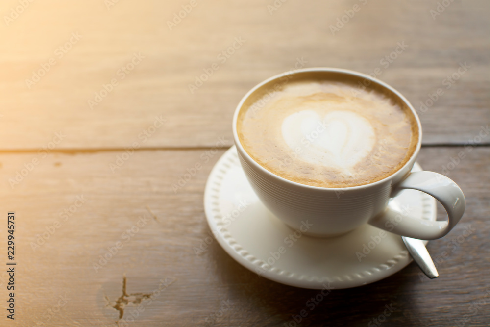 Fototapeta premium Coffee is heart-shaped in a coffee shop