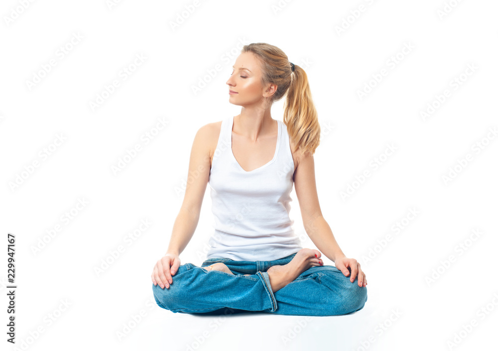 Young healthy woman doing yoga exercises, isolated on white background Young healthy woman doing yoga exercises, isolated on white background