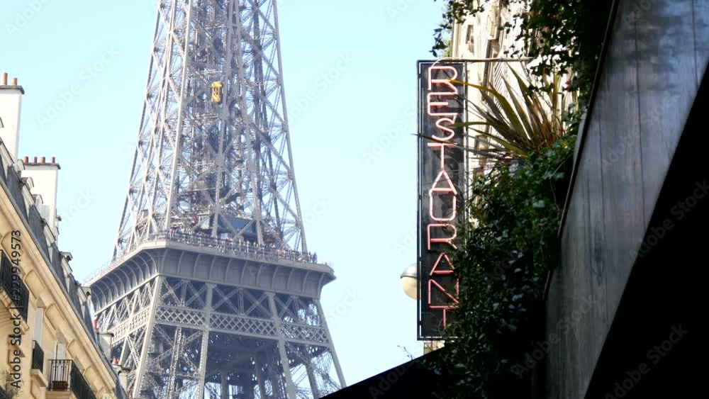 The Eiffel Tower and a restaurant of Paris