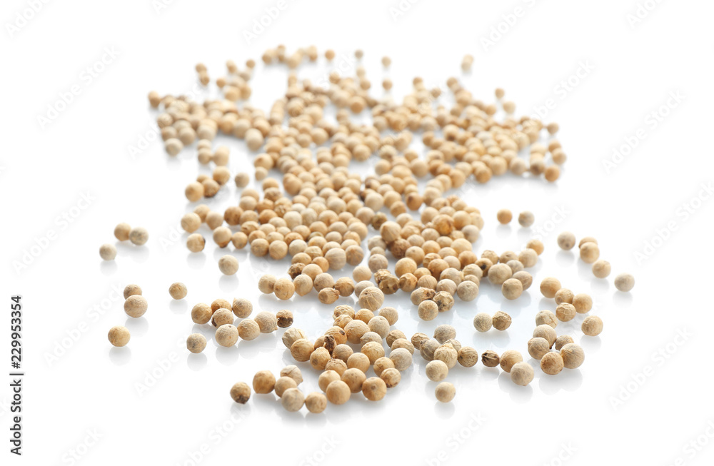 Pepper grains on white background. Natural spice Pepper grains on white background. Natural spice