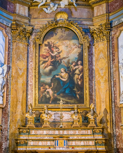 Painting "The Penitent Magdalen Adoring the Cross" by Michele Rocca, in the altar of the Church of Santa Maria Maddalena in Rome, Italy.