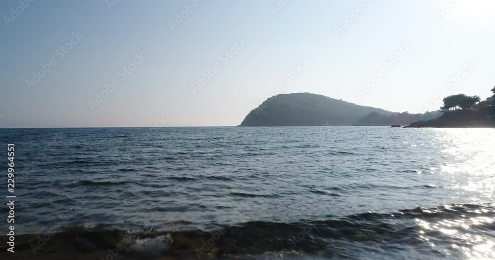 Aerial camera flying view over sea surface with waves, close up, beautiful reflections of daylight on wavy area Aerial camera flying view over sea surface with waves, close up, beautiful reflections of daylight on wavy area