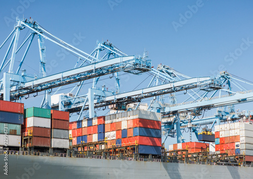 Shipping containers and a container crane