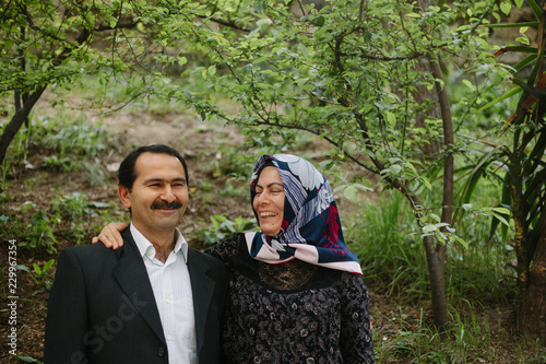 Middle aged Turkish couple show happiness and affection.