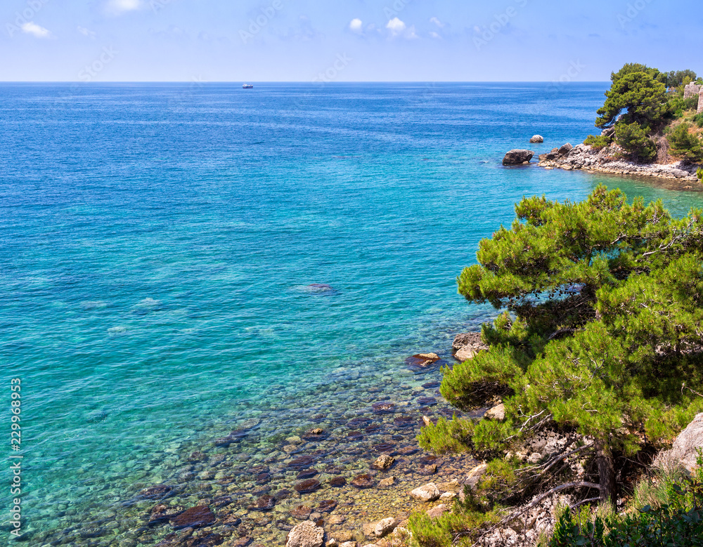 Adriatic sea coastline with turquoise water in Montenegro, nature landscape, vacations to the summer paradise