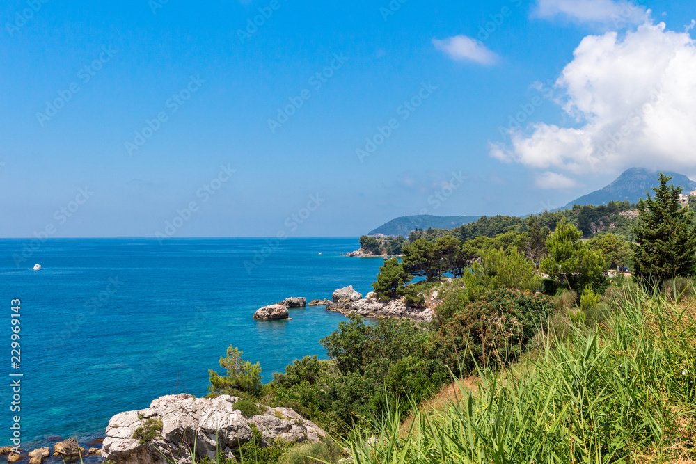 Adriatic sea coastline with turquoise water in Montenegro, nature landscape, vacations to the summer paradise