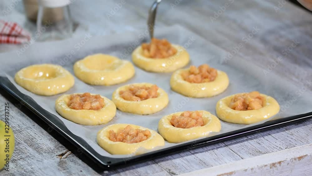 Making homemade open patties with apple. Vatrushka, apple patty - traditional Russian baking Making homemade open patties with apple. Vatrushka, apple patty - traditional Russian baking