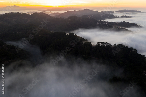 Aerial View of Sunrise Over Bay Area Hills and Misty Marine Layer