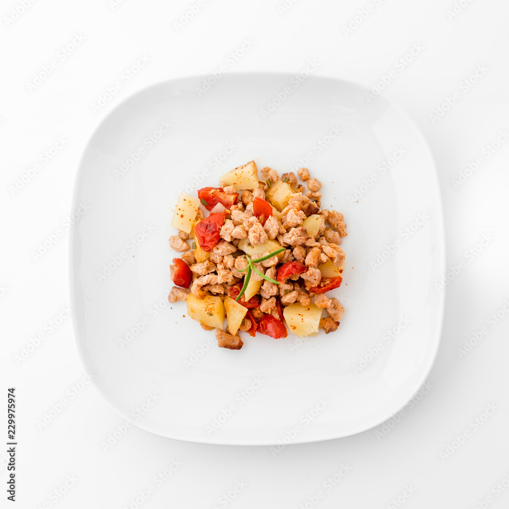 Dehydrated soy meat with potatoes, tomatoes and rosemary. Vegan Food Dehydrated soy meat with potatoes, tomatoes and rosemary. Vegan Food