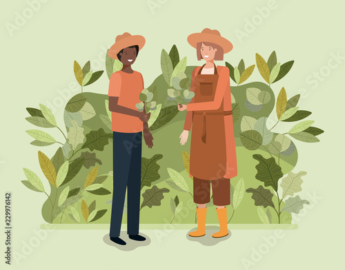 couple planting tree in the park