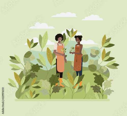 couple planting tree in the park