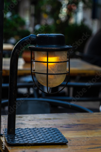 Vintage lamp on a table photo