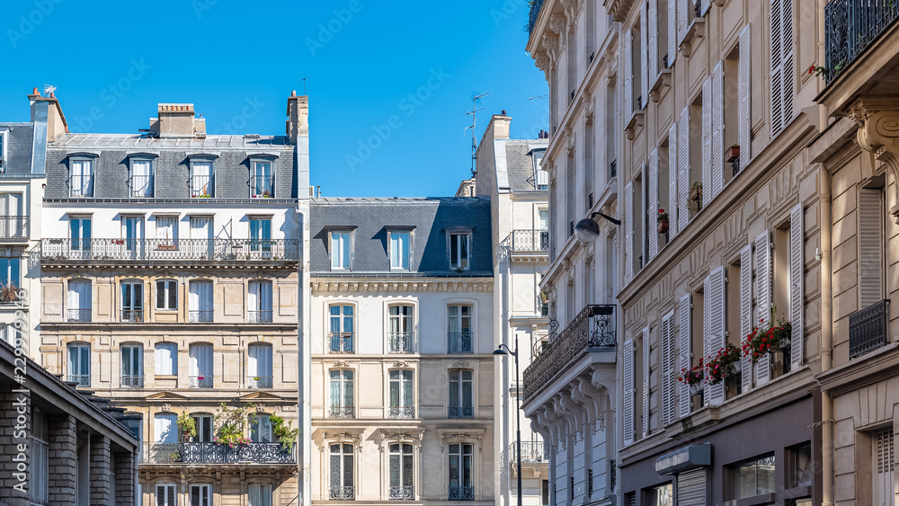 Paris, beautiful buildings boulevard des Batignolles, typical parisian facades 