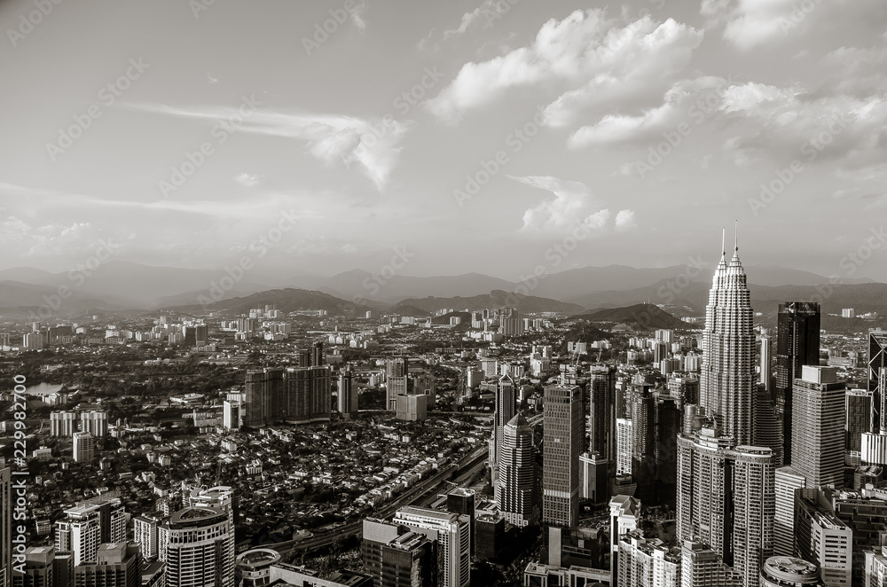 Famous Petronas Twin Towers skyscrapers Kuala Lumpur, Malaysia. Aerial skyline view
