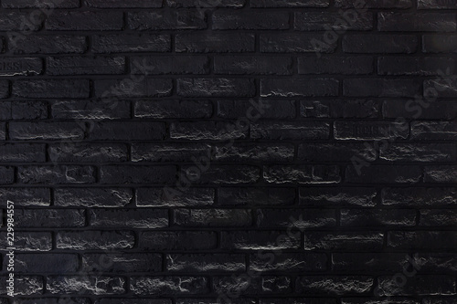 Black old brick wall detailed texture for background