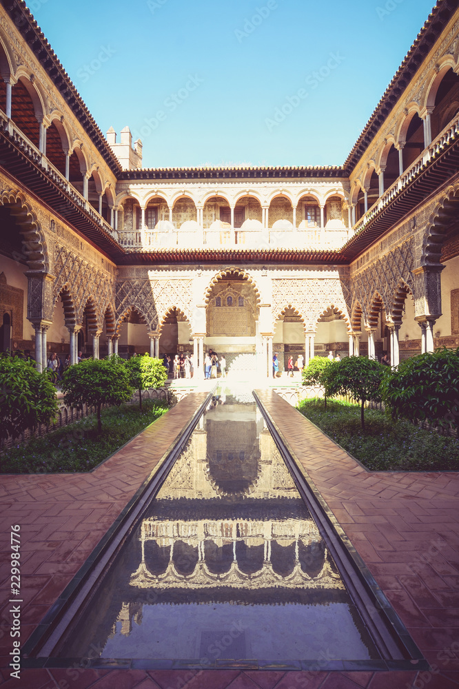 Fototapeta premium The Courtyard of the Maidens in the The Alcazar of Seville