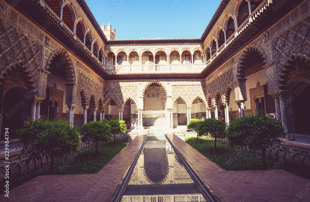 Fototapeta premium The Courtyard of the Maidens in the The Alcazar of Seville