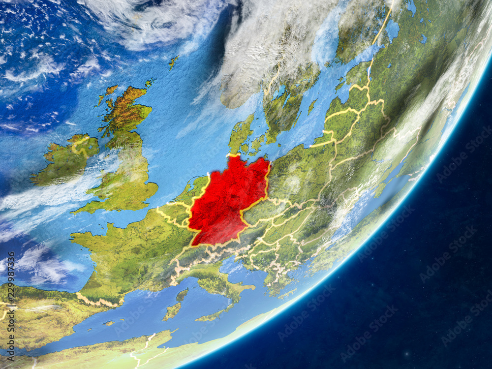 Germany on model of planet Earth with country borders and very detailed planet surface and clouds. Germany on model of planet Earth with country borders and very detailed planet surface and clouds.