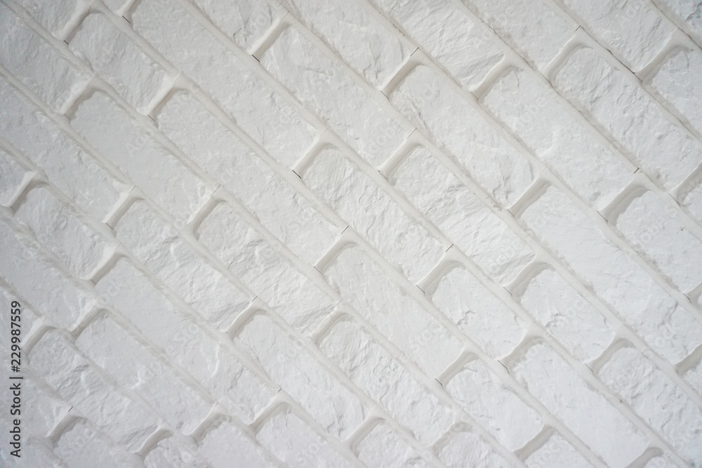 Obraz premium Nowoczesna ściana pokryta białym kamieniem