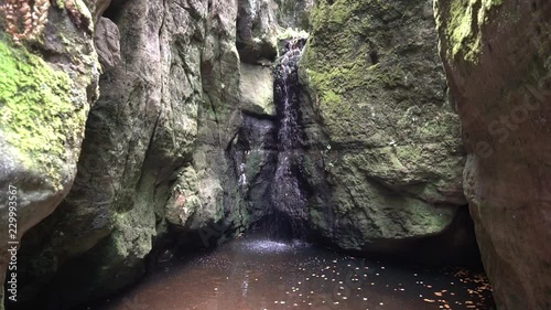 Waterfall at Adrspach Rocks on autumn day, Czech Republic