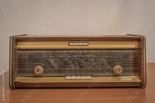 Old radio on a wooden table