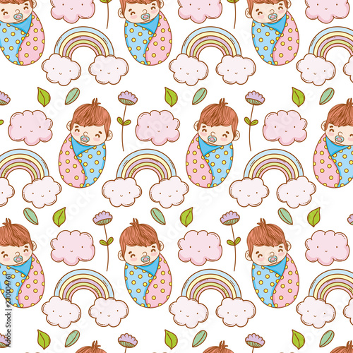 baby boy in the blanket and rainbow with clouds background