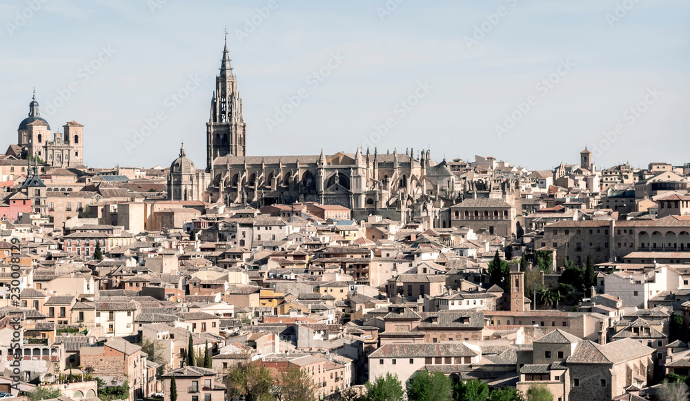 View of the Spanish city of Toledo, seen from the Gothic cathedral of Santa Maria and the Tagus river, in a structure of medieval city