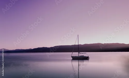 Obraz łódź o zachodzie słońca