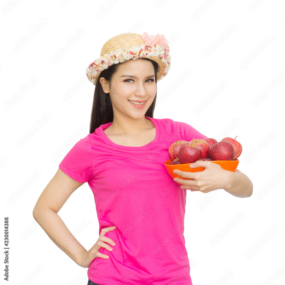 Portrait of lovely young woman holding a fresh ripe apple in bowl and smiling isolated on white background with clipping path. Healthy eating concep. Portrait of lovely young woman holding a fresh ripe apple in bowl and smiling isolated on white background with clipping path. Healthy eating concep.