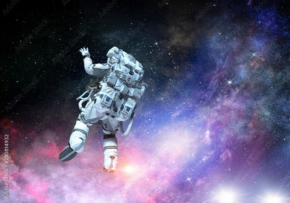 Fototapeta premium Astronaut on space mission. Mixed media