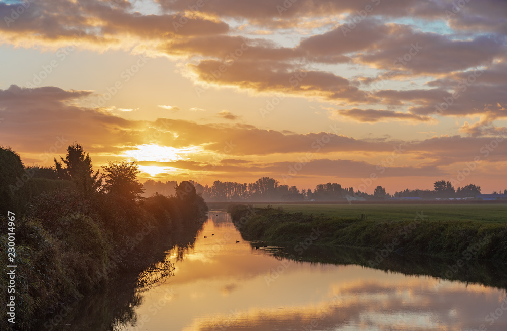 Obraz premium Canal at Sunrise