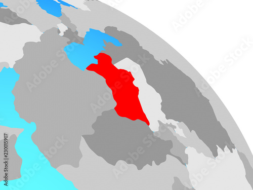 Turkmenistan on simple blue political globe. photo