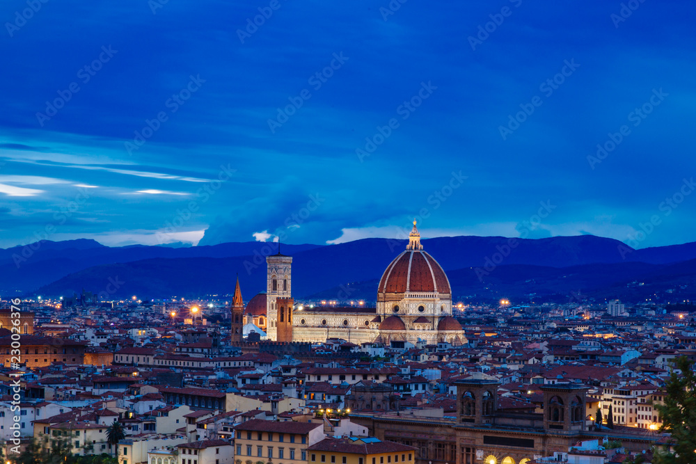 Florence Cathedral and the city of Florence, Italy at night