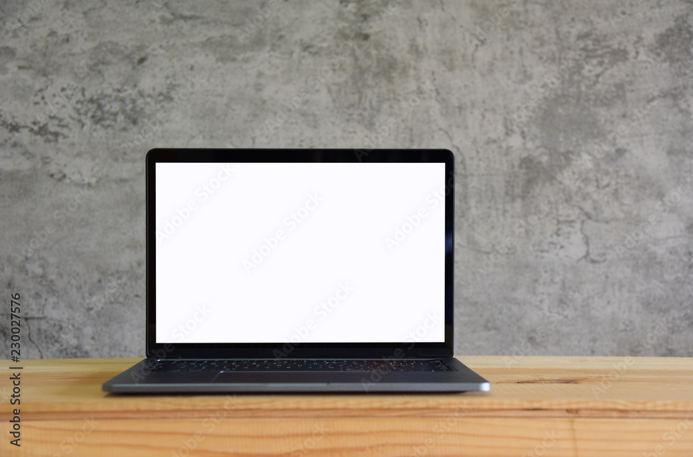 Blank screen Laptop on wooden table in room Loft style Blank screen Laptop on wooden table in room Loft style