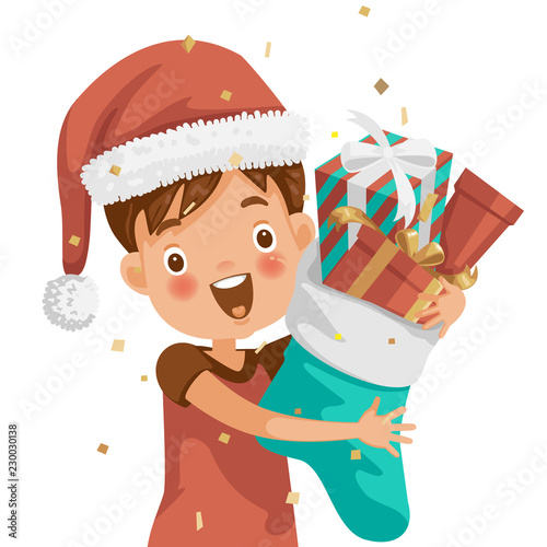 Christmas Excitement boy in Christmas hat. Glad and surprise with gifts. Hold big socks with gift box. One person in The face is smiling and open with a very excited mood. Feeling very happy children.