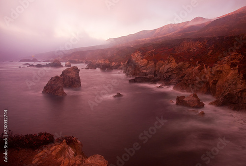 Sunset at Garrapata State Park, Big Sur, California on a cloudy day.