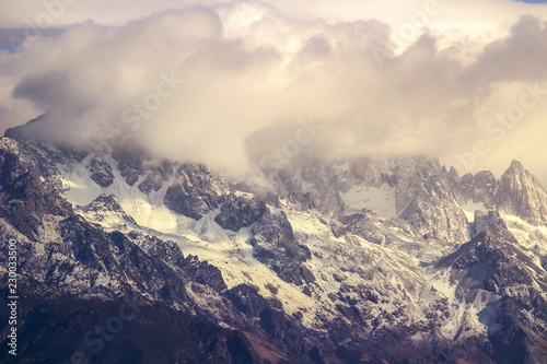 Peak of Jade Dragon Snow Mountain in the cloud mist, Lijiang, China
