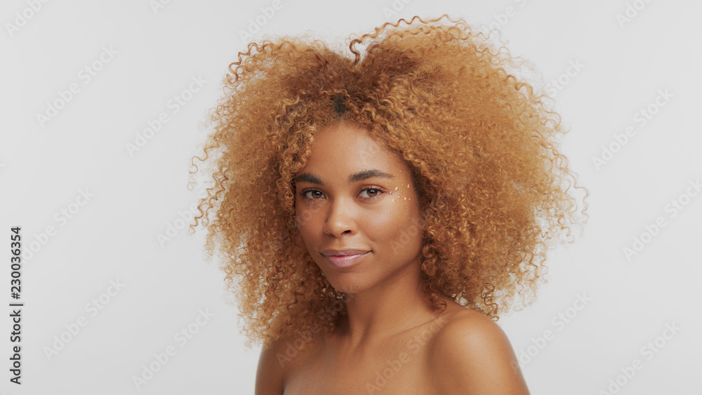 mixed race black blonde model with curly hair mixed race black blonde model with curly hair