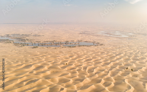 view from above, overlooking sunrise in a desert photo