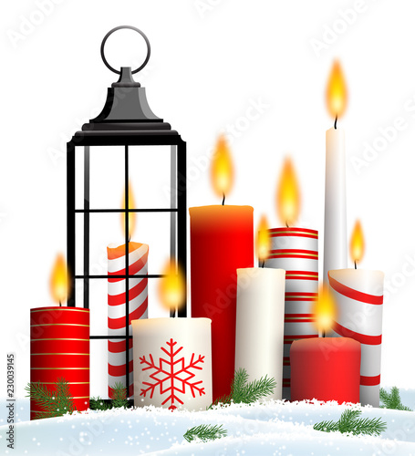 Christmas still-life with group of candles in snow