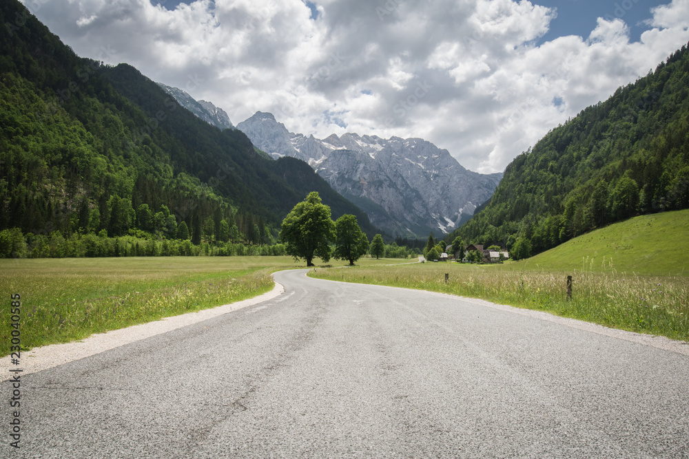 empty alpine mountain road in logar valley, Slovenia
