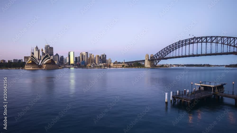 4k UHD time lapse of night to day sunrise scene at Sydney city skyline. Tilt up 4k UHD time lapse of night to day sunrise scene at Sydney city skyline. Tilt up