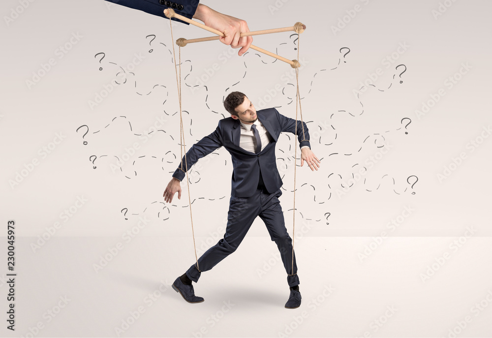 Marionette businessman with doodle lines and arrows around him
Marionette businessman with doodle lines and arrows around him