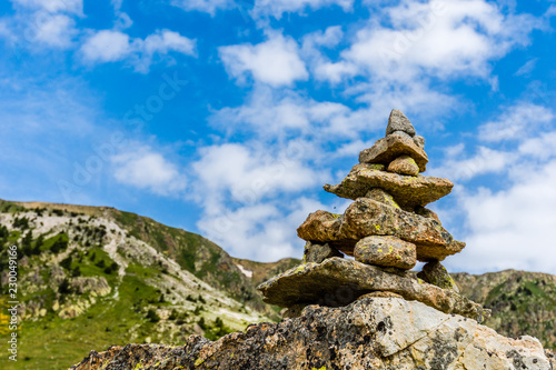 Manmade boulders stack into the mountains. © zkcristian