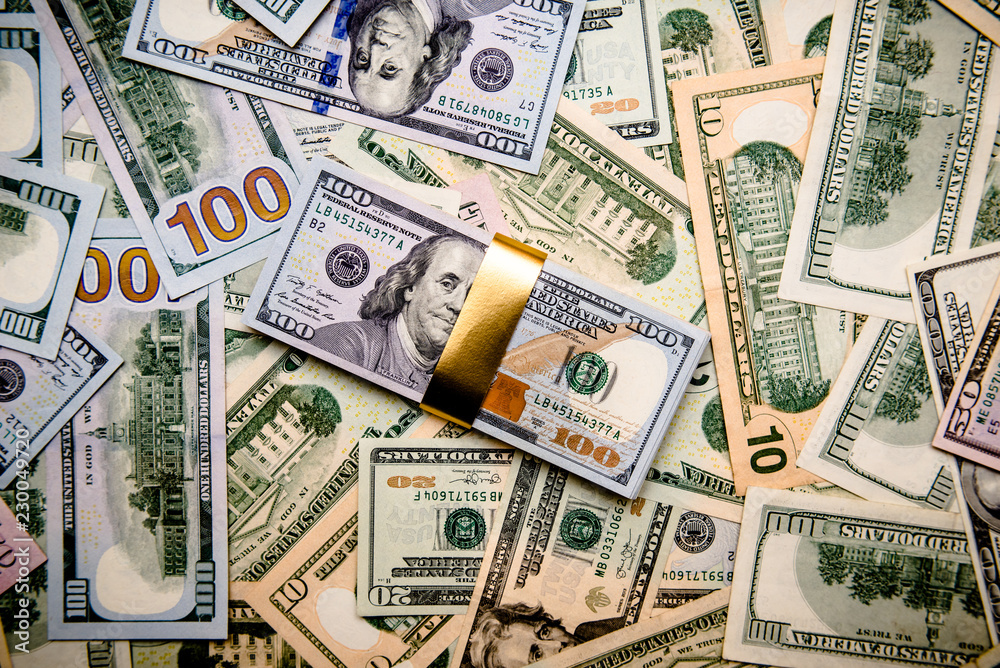 Fototapeta premium a pack of lies the US currency on background of dollars 