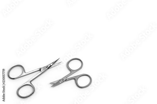 Nail Clippers for nail and cuticle care. Scissors of different size on white background.