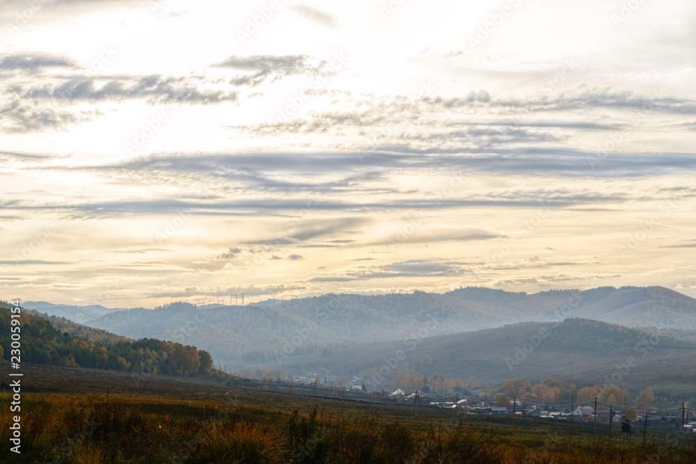 Autumn mountain forest landscape with roads and rivers Autumn mountain forest landscape with roads and rivers