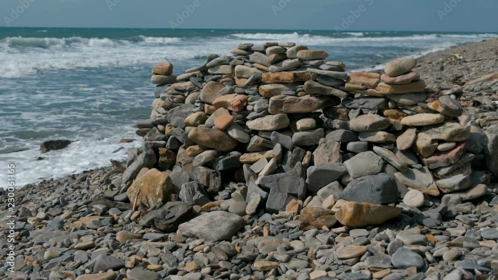 Wall of stones on the sea shore beach. Wall of stones on the sea shore beach.